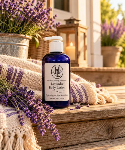 Lavender Body Lotion in a cobalt blue pump bottle on a porch step with fresh lavender, Homestead Lavender Farm